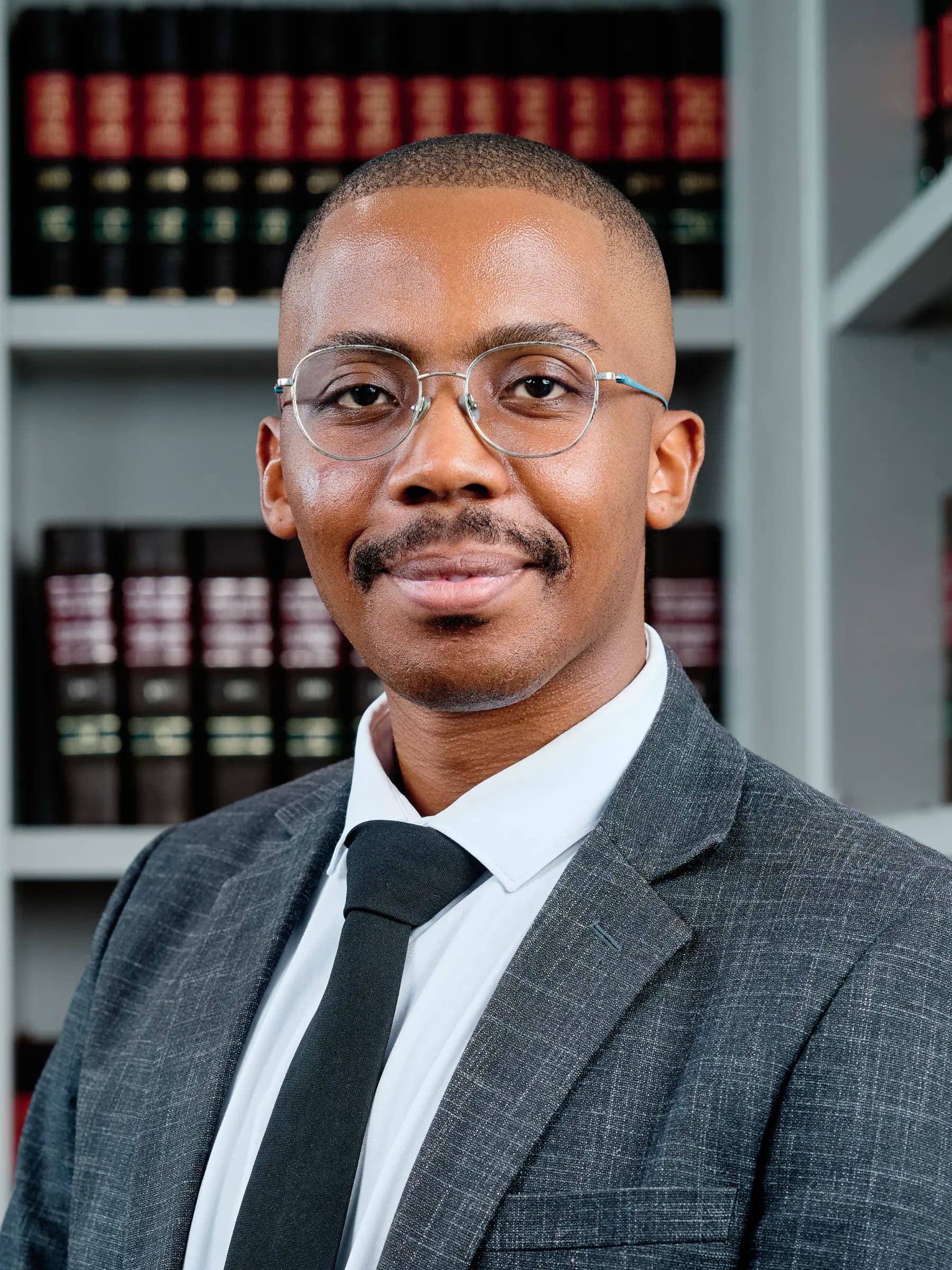 On-site corporate headshot setup in a Cape Town office meeting room with backdrop and lighting in place